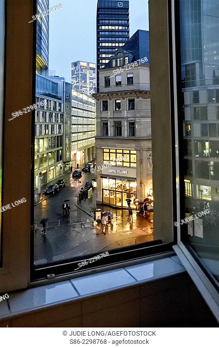 Looking at Kaiserplatz, Frankfurt, Germany, on a Rainy Night. through an open window