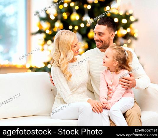 happy family at home over christmas tree