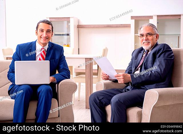 The two businessman discussing business in office