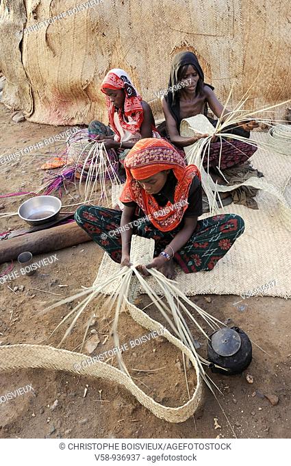 Afar women weaving mats. Ahmedila village. Afar region. Ethiopia