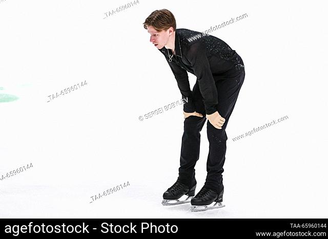 RUSSIA, CHELYABINSK - DECEMBER 21, 2023: Figure skater Alexei Yerokhov who has fallen during the men's short programme event of the 2024 Russian Figure Skating...