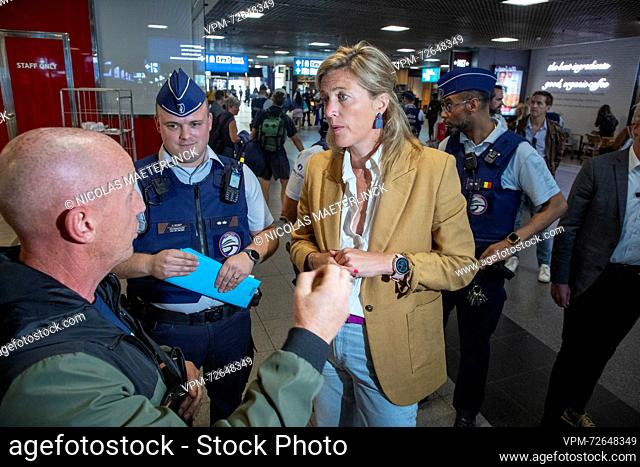 Interior Minister Annelies Verlinden (C) pictured during a police action related to crime and anti-social behaviour in and around Brussel-Zuid/ Bruxelles-Midi...