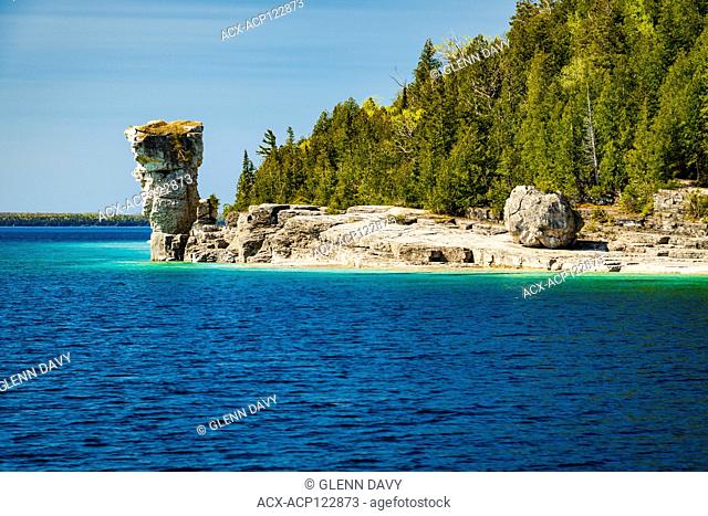 Large 'flowerpot' (sea stack) as seen from the water, Flowerpot Island, Fathom Five National Marine Park, Ontario, Canada