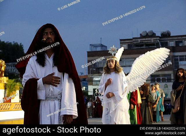 MEXICO CITY, MEXICO - APR 14, 2022: A Faithful disguised as Jesus takes part perform on ""Holy Thursday"" at the 179th representation of the Passion of Christ...