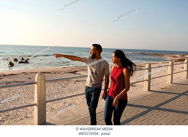 Couple walking at promenade