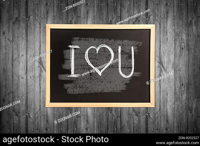 Chalkboard, wooden frame with i love you note isolated on white