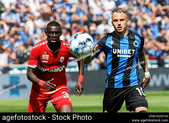 Antwerp's Abdoulaye Seck and Club's Noa Lang fight for the ball during a soccer match between Club Brugge KV and Royal Antwerp FC