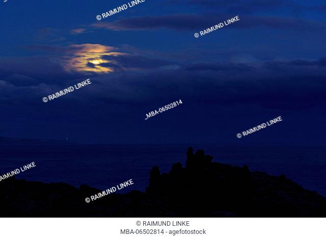 Lava rock coast with moon at dawn, Charco del Viento, La Guancha, Tenerife, Canary Islands, Spain