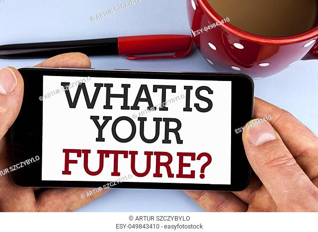 Word writing text What Is Your Future Question. Business concept for Where do you see yourself in the next years written Mobile Phone Screen holding by man the...