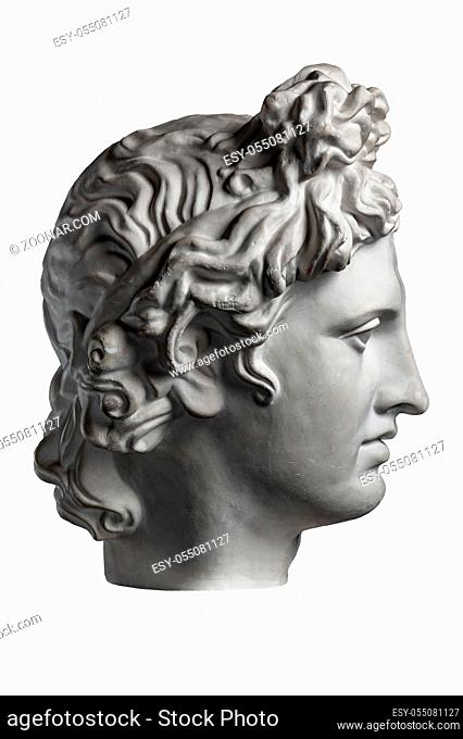 White gypsum copy of ancient statue of Apollo God of Sun head for artists on a white background. Renaissance epoch. Plaster sculpture of man face
