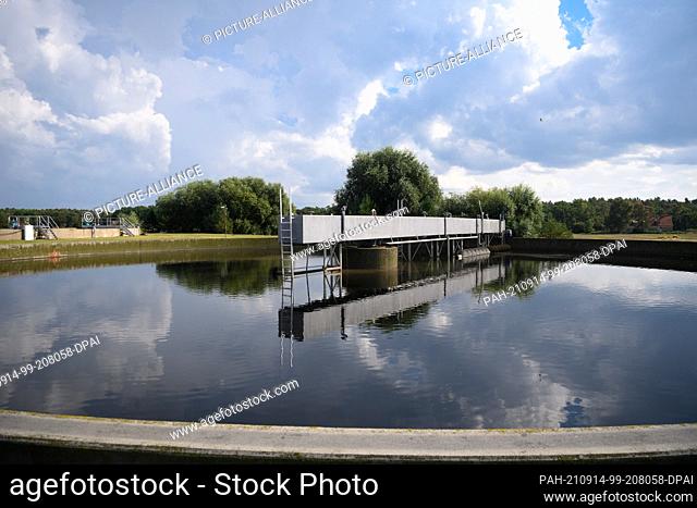 10 September 2021, Brandenburg, Brandenburg/Havel: Wastewater is treated in secondary clarifier 1 on the site of the Briest sewage treatment plant operated by...