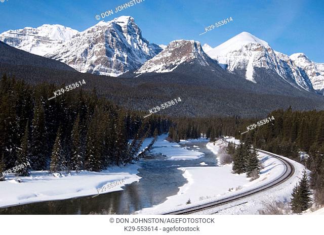 Bow River along Bow Valley Parkway with rail line. Alberta, Canada