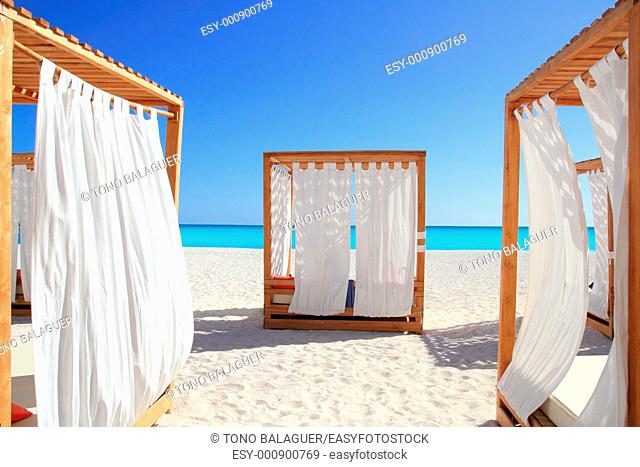 Caribbean gazebo beds in tropical beach sand tranquil vacations