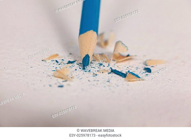 Blue colored pencil with broken tip