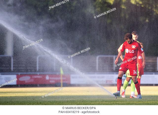 Leverkusen's Admin Mehmed steps on a lawn sprinkler during the friendly match between Bayer 04 Leverkusen and UD Levante in Bergisch Gladbach, Germany