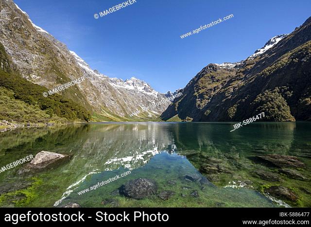 Reflection in Lake Marian, Fiordland National Park, Te Anau, Southland, South Island, New Zealand, Oceania
