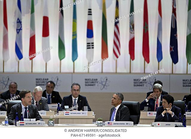 United States President Barack Obama, center, and Shinzo Abe, Japan's prime minister, right, listen as Mark Rutte, Dutch prime minister