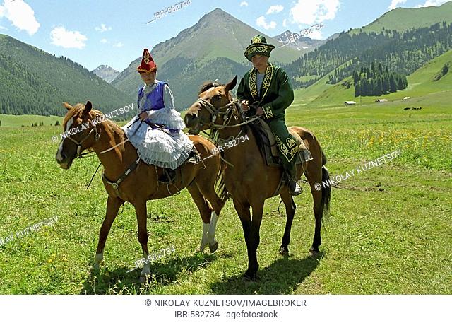 Horsemen in national clothes. Akkol Canyon, Kazakhstan