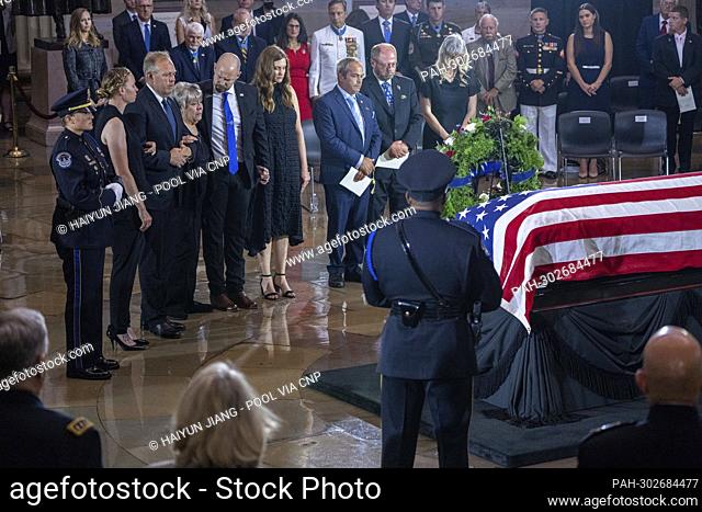 Family members of Woodrow “Woody” Williams pay tribute at a Lying in Honor event on Capitol Hill for Williams in the Rotunda on Thursday, July 14, 2022