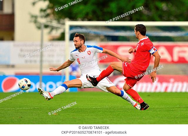 Tomas Sivok of Czech Republic, left, and Roderick Briffa of Malta in action during a friendly soccer match between Czech Republic and Malta in Kufstein, Austria