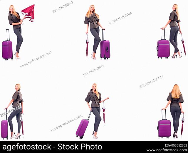 Young beautiful woman with suitcase and umbrella isolated on white