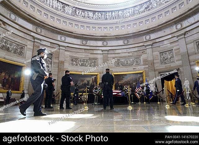 People pay their respects to slain U.S. Capitol Police officer William “Billy” Evans as he lies in honor at the Capitol in Washington, Tuesday, April 13, 2021