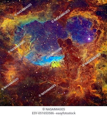 Massive stars lie within NGC 6357 or Lobster Nebula, an expansive emission nebula complex in the constellation Scorpius. Retouched colored image
