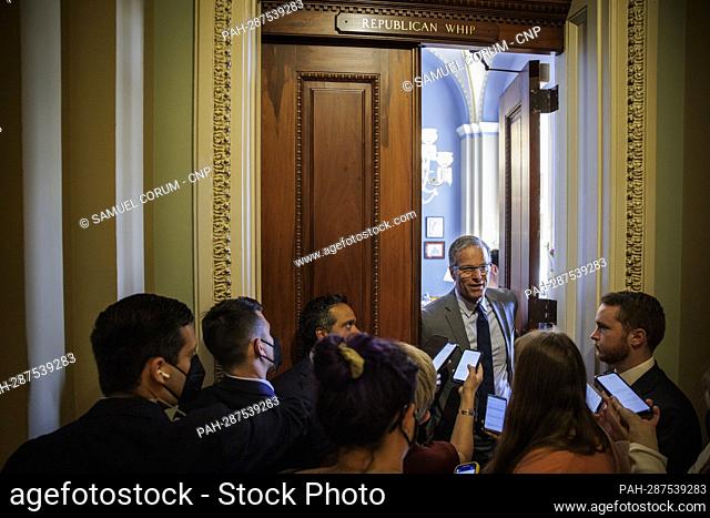 United States Senate Minority Whip Senator John Thune (Republican of South Dakota) talks to reporters outside of his office on Capitol Hill in Washington, DC