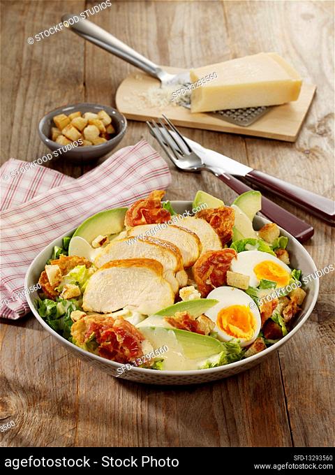 Ceasar salad with avocado and hard-boiled eggs