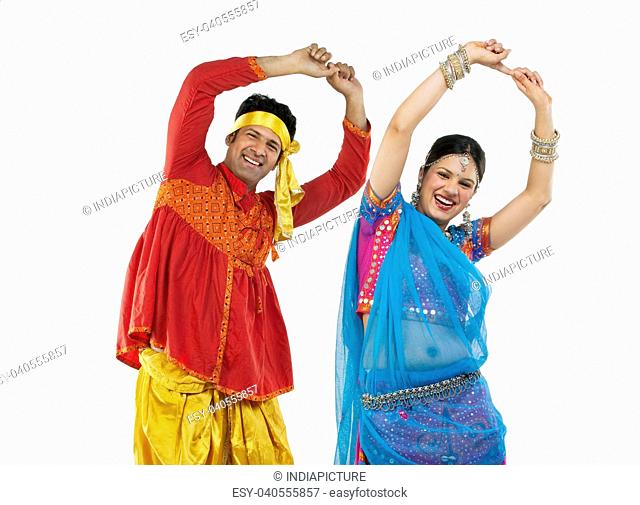 Gujarati couple dancing