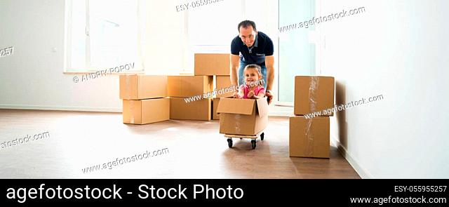 Happy People Moving Into New House Or Home