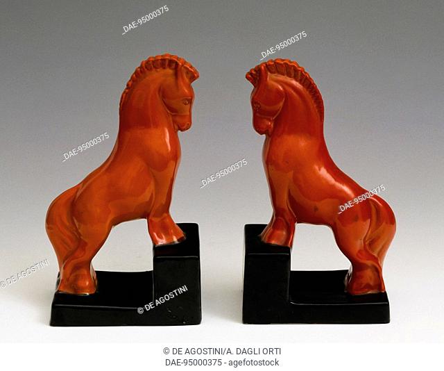 Pair of bookends representing horses, black and red ceramic, Perugia manufacture, Italy, 20th century.  Private Collection