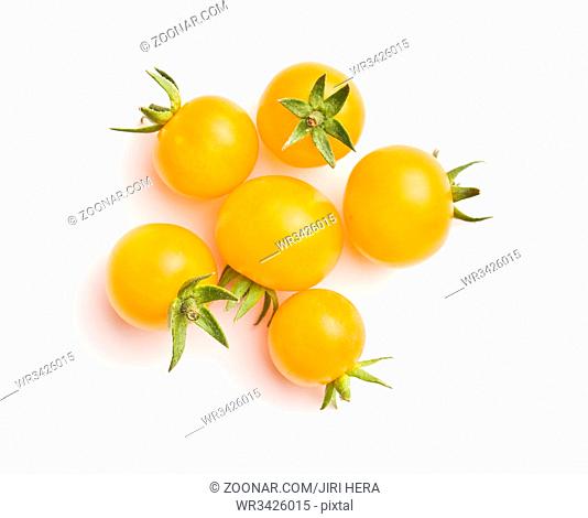Tasty yellow tomatoes isolated on white background