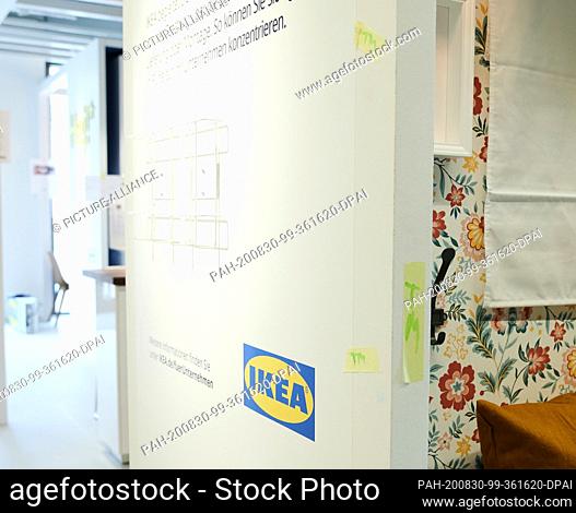 28 August 2020, Berlin: Crepe tape with memorial letters is still sticking to the walls of an XS Ikea store. On 1.9. a miniature edition of the Ikea furniture...