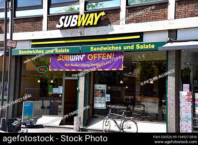 26 May 2020, North Rhine-Westphalia, Cologne: A branch of SUBWAY, a US-American franchise chain in the fast food sector, outdoor shot with the sign Only...