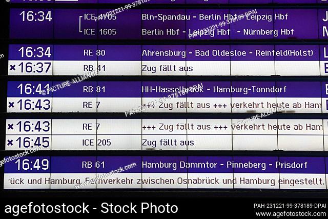 dpatop - 21 December 2023, Hamburg: Train cancellations are shown on a display board at the main station. Storm ""Zoltan"" is causing cancellations and delays...