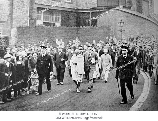 Mahatma Gandhi visiting a Lancashire Cotton Mill, England, 1931, . Mohandas Gandhi (1869 – 1948) was the preeminent leader of the Indian independence movement...