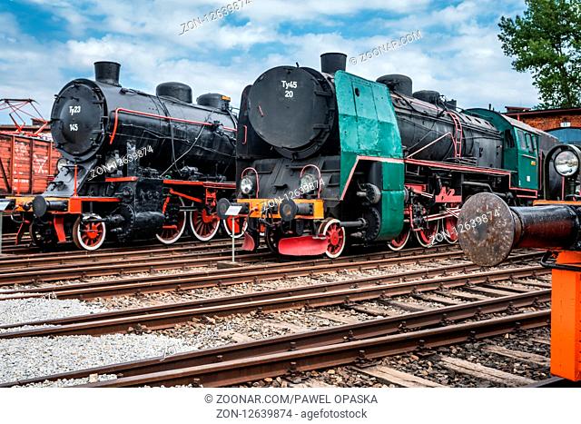 Jaworzyna Slaska, Poland - August 2018 : Old disused retro train locomotives on the side tracks in the depot in the Museum of Industry and Railway in Silesia