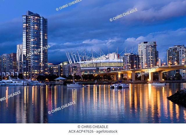 Cambie Bridge, city skyline with new retractable roof on BC Place Stadium, False Creek, Vancouver, British Columbia, Canada