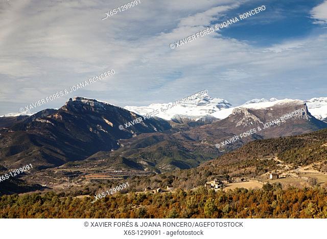 View of Las Tres Sorores peaks -Añisclo, Monte Perdido and Marboré- and San Lorién village, National Park of Ordesa and Monte Perdido, Huesca, Spain