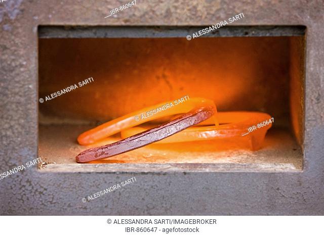 Red hot horseshoes in a stove, North Tyrol, Austria, Europe