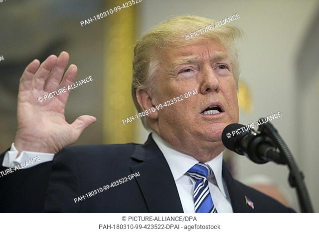 US President Donald J. Trump delivers remarks before signing a presidential proclamation on steel and aluminum tariffs, in the Roosevelt Room of the White House...