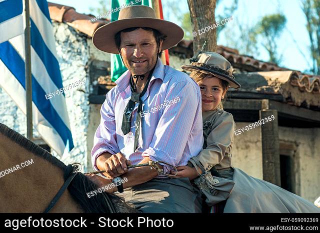 Tacuarembo, Uruguay - March 9, 2018: Gauchos (South American cowboys) poses during the Traditional Gauchos Feast