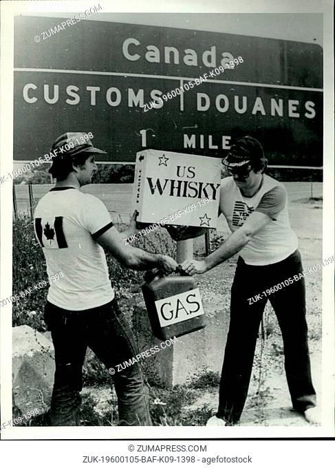 1972 - A thirsty Quebecer and a gas-starved American exchange goods at the Canadian-US border at Champlain, NY. (Credit Image: © Keystone Pictures USA/ZUMAPRESS