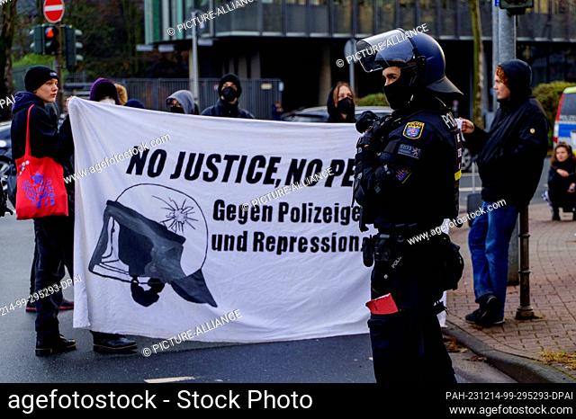 14 December 2023, Hesse, Frankfurt/Main: Police and activists confront each other at a spontaneous rally. The police began clearing the occupied former Dondorf...