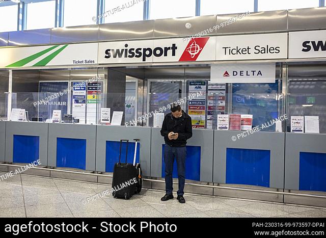 16 March 2023, Greece, Athen: A passenger waits at the empty Eleftherios Venizelos International Airport during a 24-hour strike