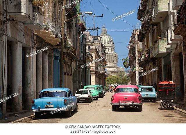 Old American cars used as taxi near the Capitolio building in Central Havana, Cuba, West Indies, Central America