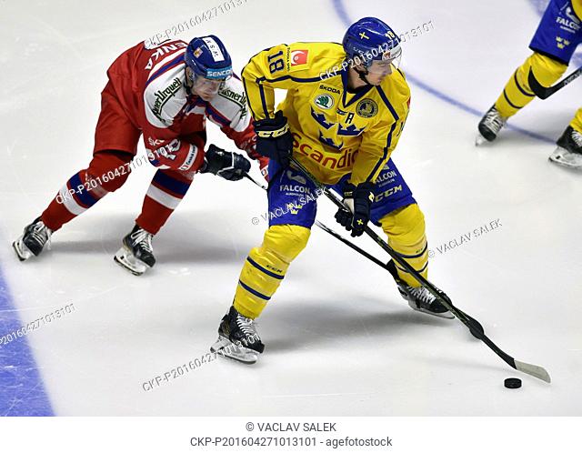 Roman Cervenka (CZE), left, and Mikael Backlund (SWE) in action during the Euro Hockey Tour series match Czech Republic vs Sweden in Znojmo, Czech Republic
