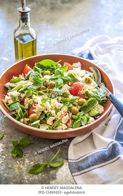 Feta salad with vegetables and basil
