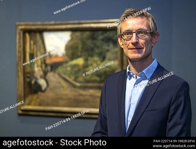 PRODUCTION - 08 July 2022, Berlin: Ralph Gleis, director of the Alte Nationalgalerie, stands next to his favorite work by the painter Max Liebermann